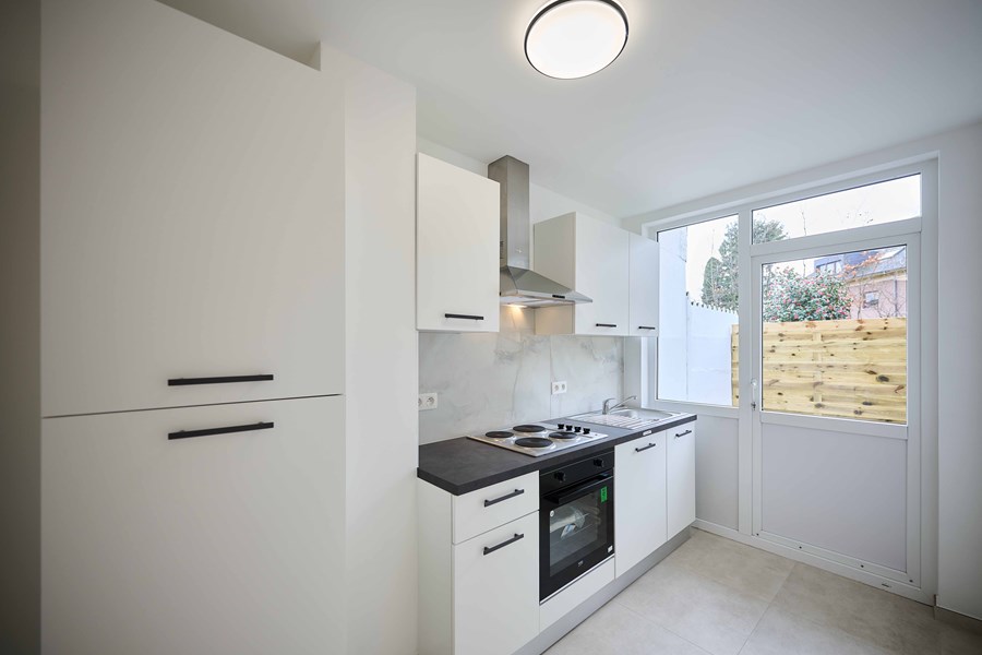 Cuisine moderne et équipée du duplex en colocation Hellebaut 18